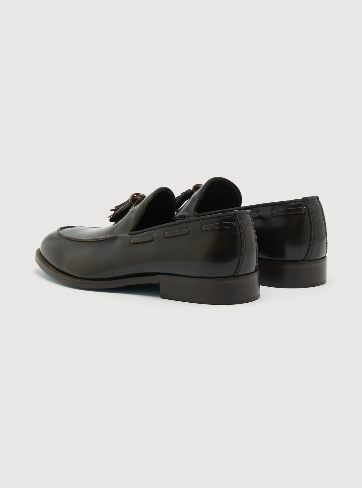 Mocassino in pelle con nappine