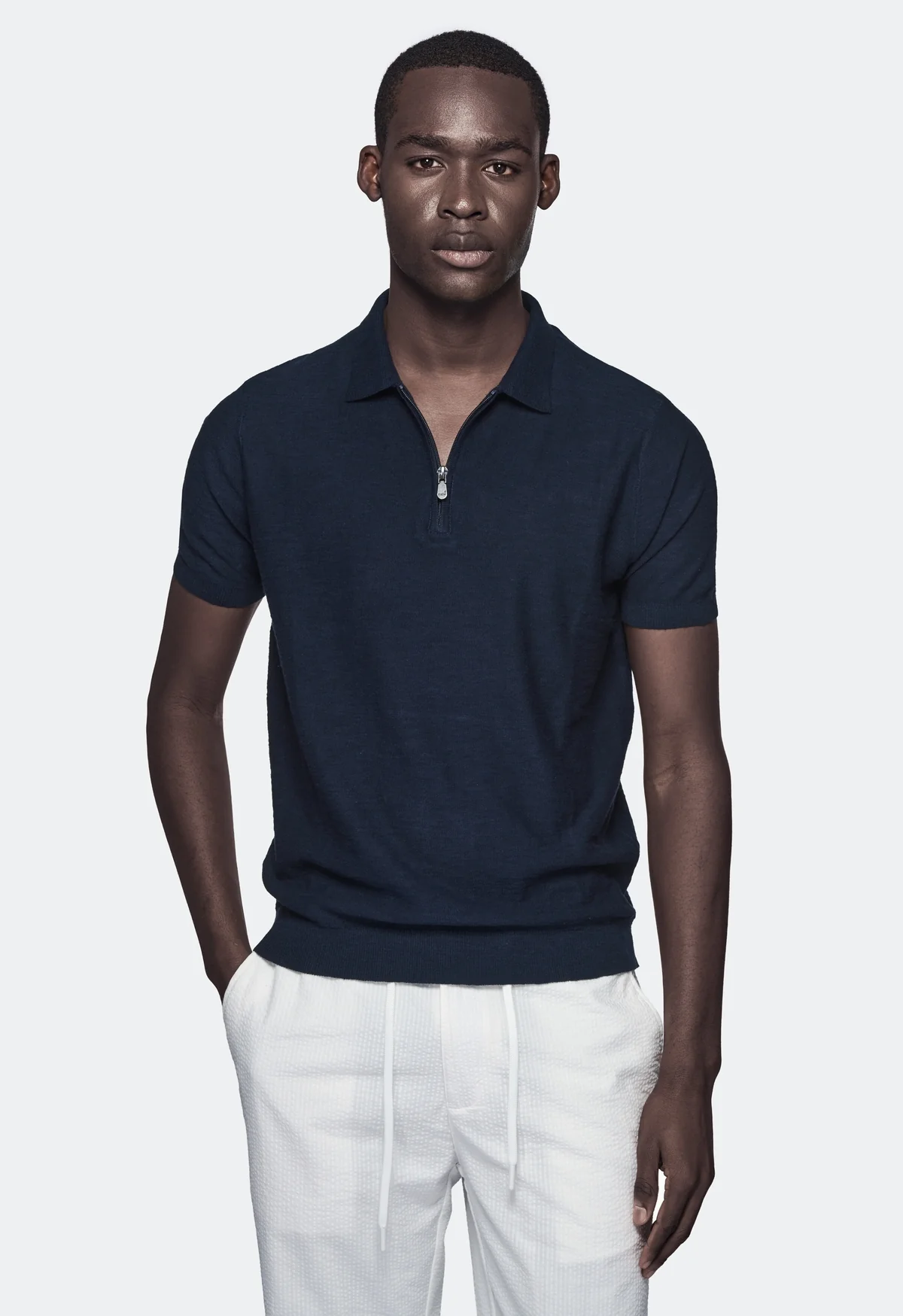 Polo in cotone e lino con zip