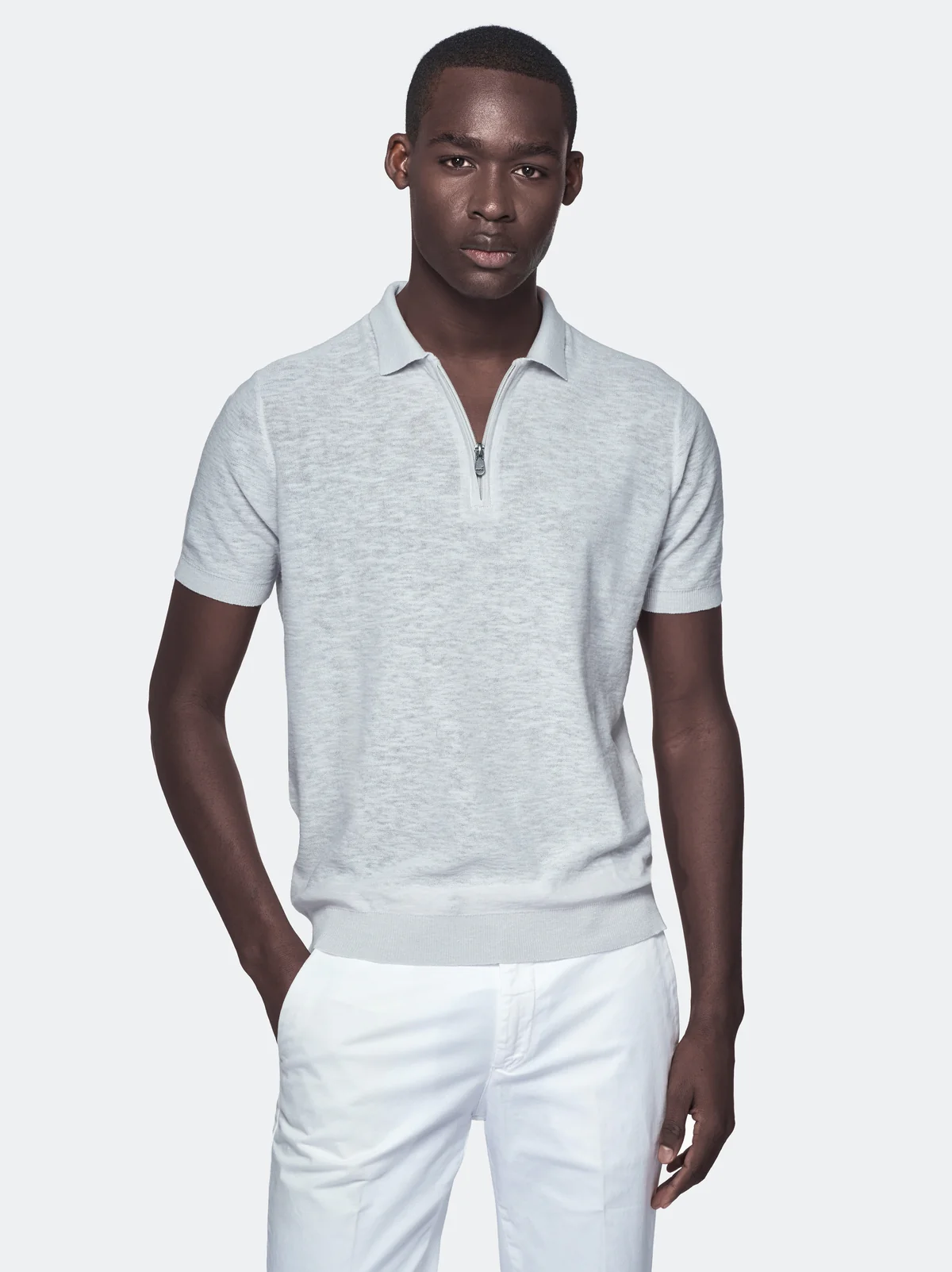 Polo in cotone e lino con zip